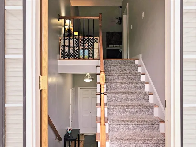 a view of entryway with a front door