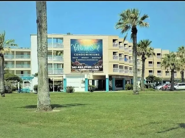 a view of building with yard