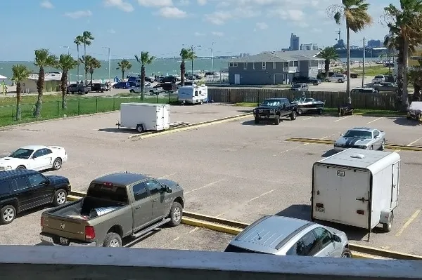 a view of a patio with couches and a table and chairs