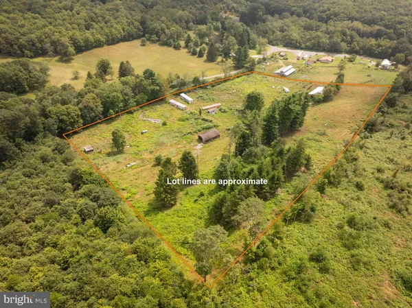 a aerial view of residential houses with outdoor space
