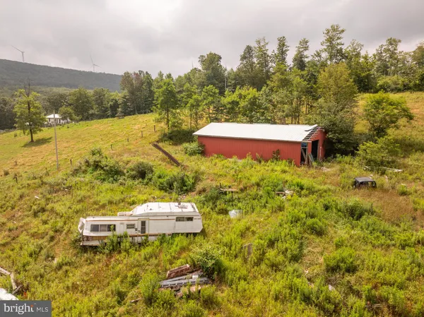 a view of a yard with an outdoor space