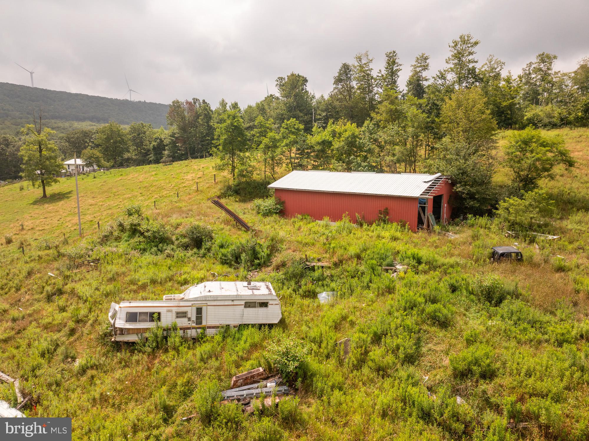 1055 Old Wilson Road Swanton, MD 21561 - Photo 7 of 19 a view of a lake with a mountain in the background