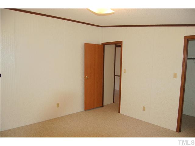 514 Dick Holeman Road Timberlake, NC 27583 - Photo 13 of 21 a view of an empty room