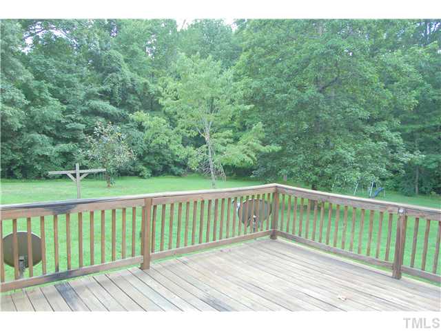 514 Dick Holeman Road Timberlake, NC 27583 - Photo 15 of 21 a view of a wooden deck