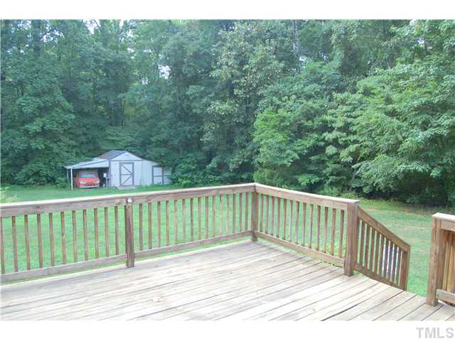 514 Dick Holeman Road Timberlake, NC 27583 - Photo 17 of 21 a terrace view with two trees in the background