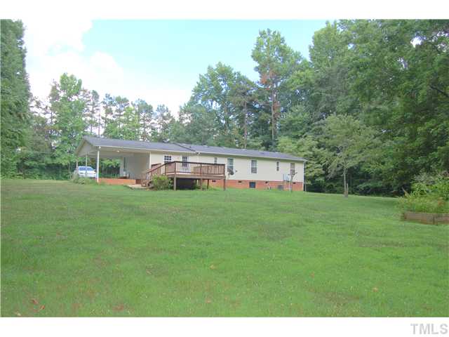 514 Dick Holeman Road Timberlake, NC 27583 - Photo 19 of 21 a view of a house with a big yard