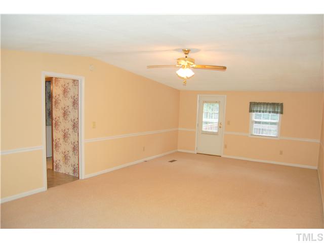 514 Dick Holeman Road Timberlake, NC 27583 - Photo 5 of 21 a view of an empty room with a window