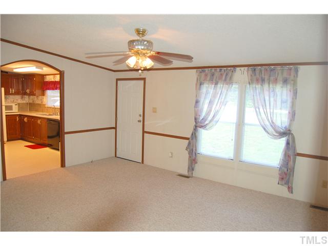 514 Dick Holeman Road Timberlake, NC 27583 - Photo 8 of 21 a view of an empty room with a window