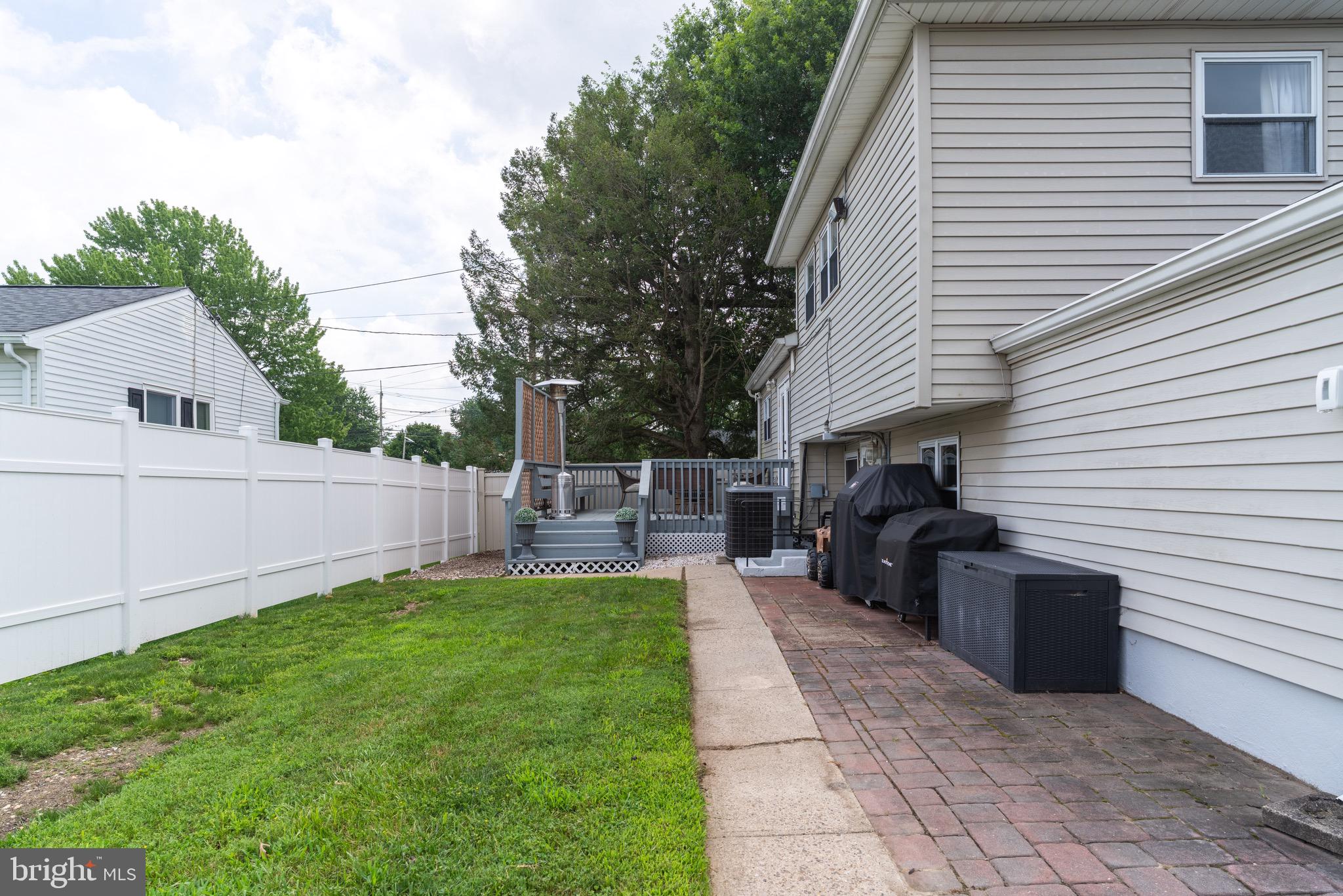 30 Rock Royal Road Hamilton, NJ 08620 - Photo 19 of 54 a view of a house with a backyard and a patio