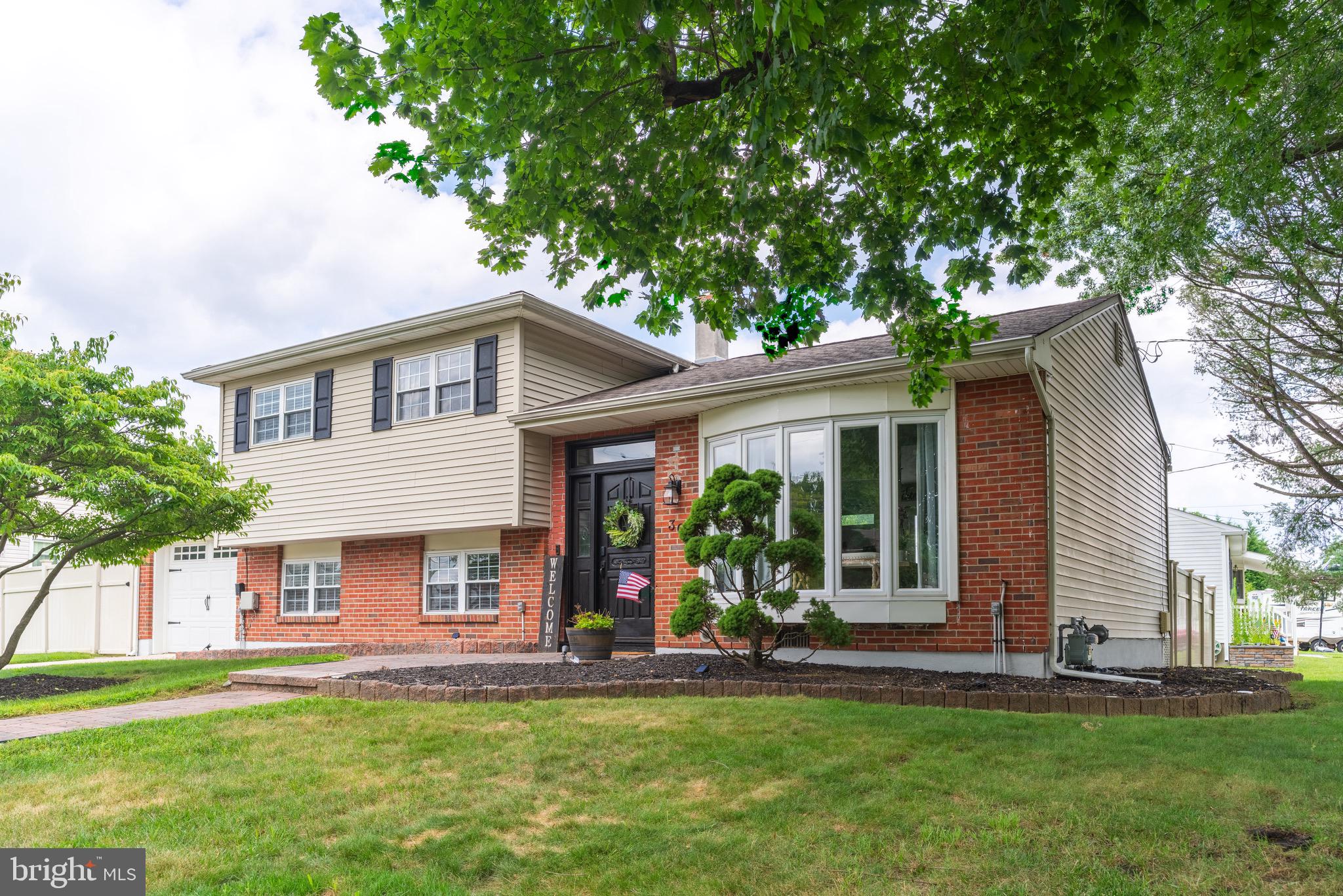 30 Rock Royal Road Hamilton, NJ 08620 - Photo 2 of 54 a view of a house with a yard and sitting area