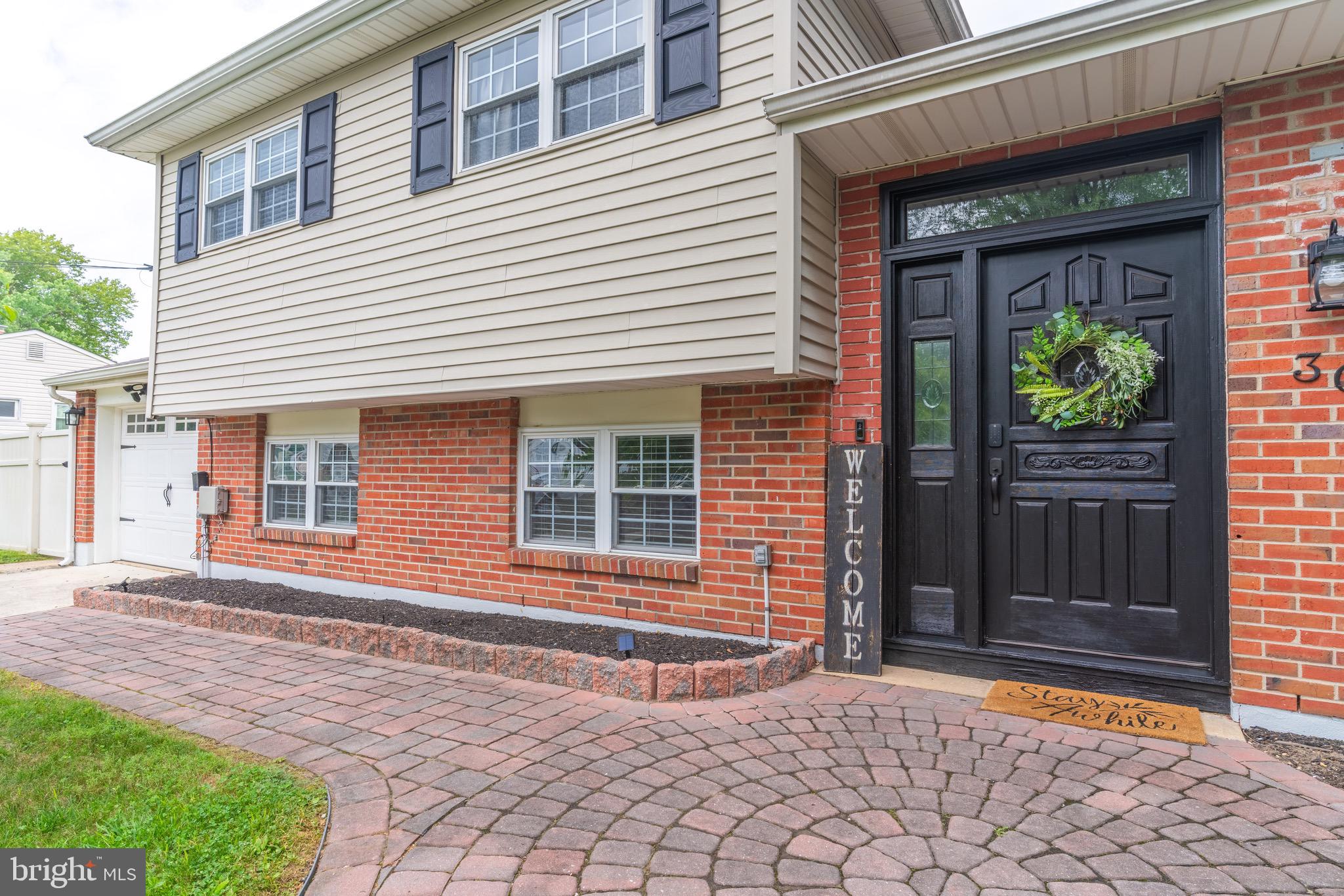 30 Rock Royal Road Hamilton, NJ 08620 - Photo 3 of 54 a front view of a house with a porch