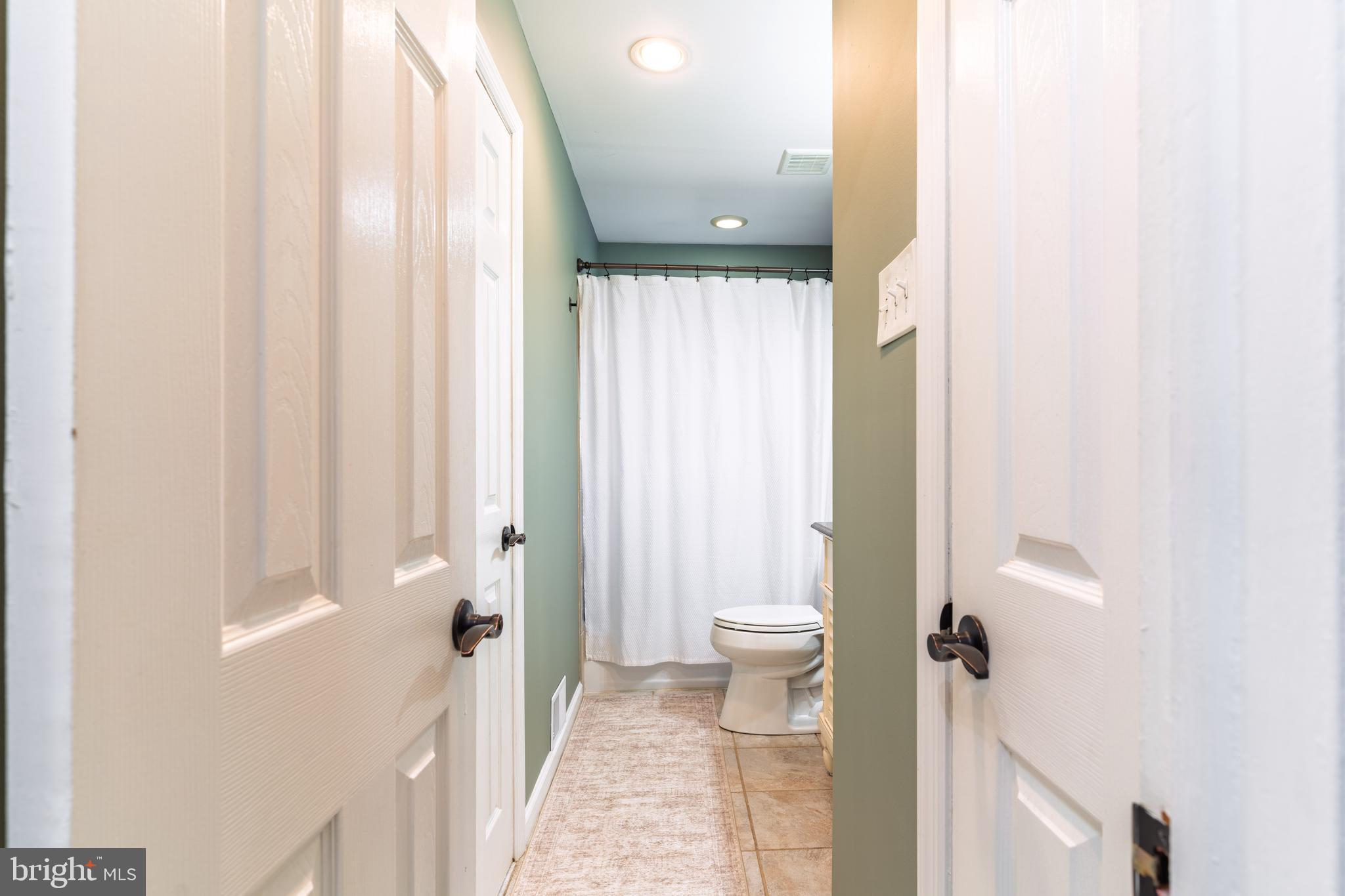 30 Rock Royal Road Hamilton, NJ 08620 - Photo 49 of 54 a bathroom with a sink and a toilet