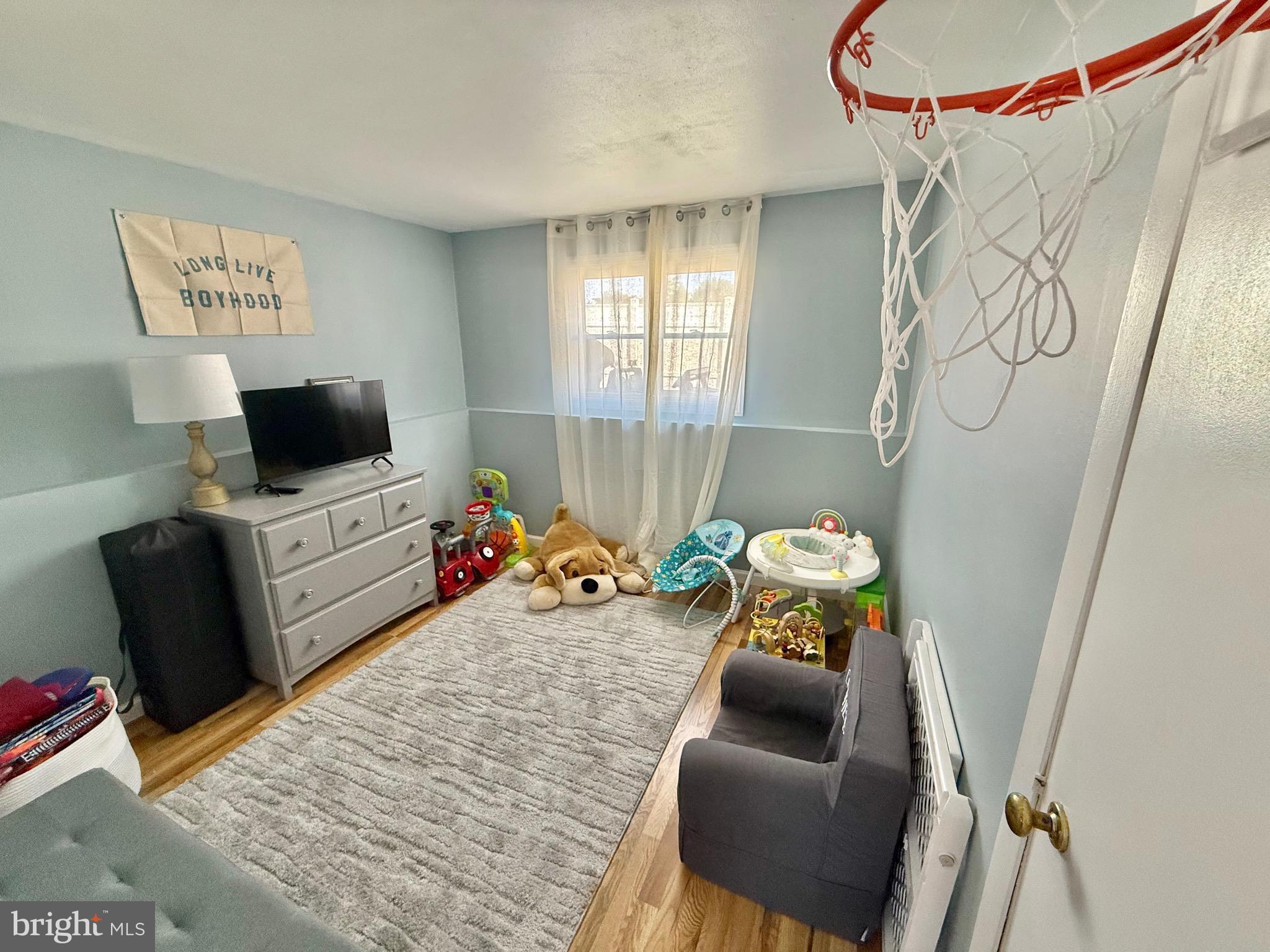 30 Rock Royal Road Hamilton, NJ 08620 - Photo 52 of 54 a bedroom with furniture and a wooden floor