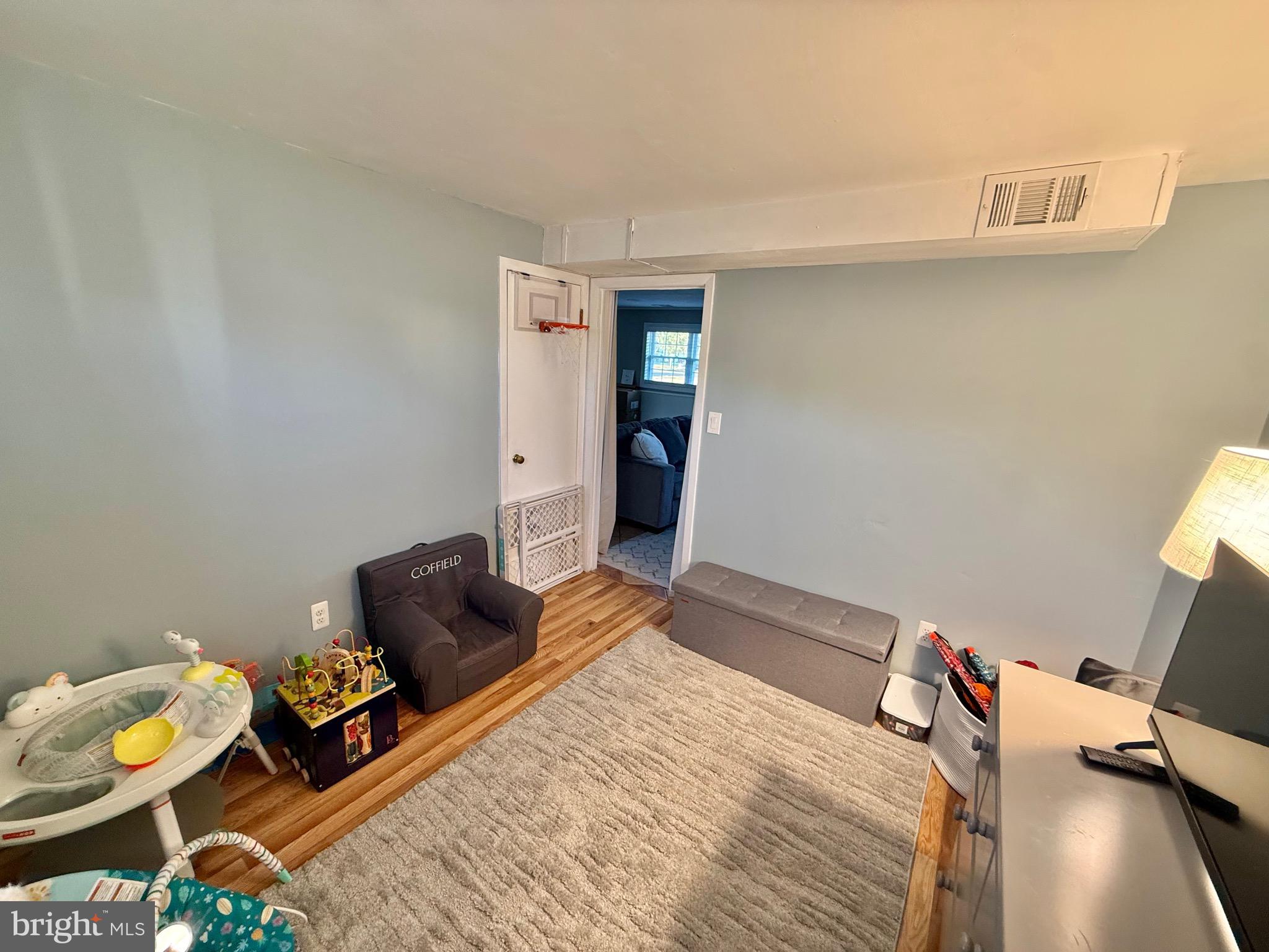 30 Rock Royal Road Hamilton, NJ 08620 - Photo 54 of 54 a bedroom with a bed and wooden floor