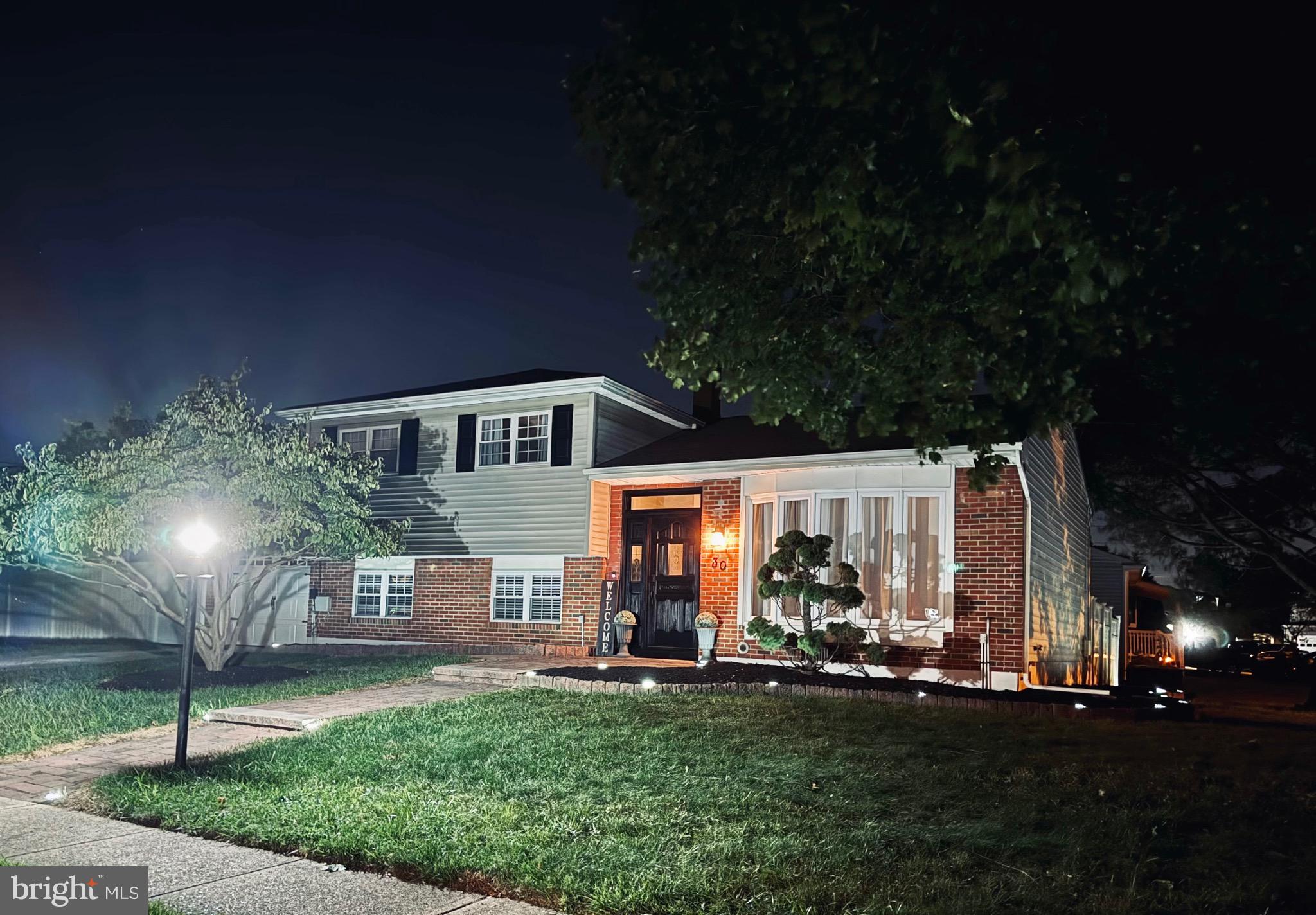 30 Rock Royal Road Hamilton, NJ 08620 - Photo 8 of 54 a view of house with a yard