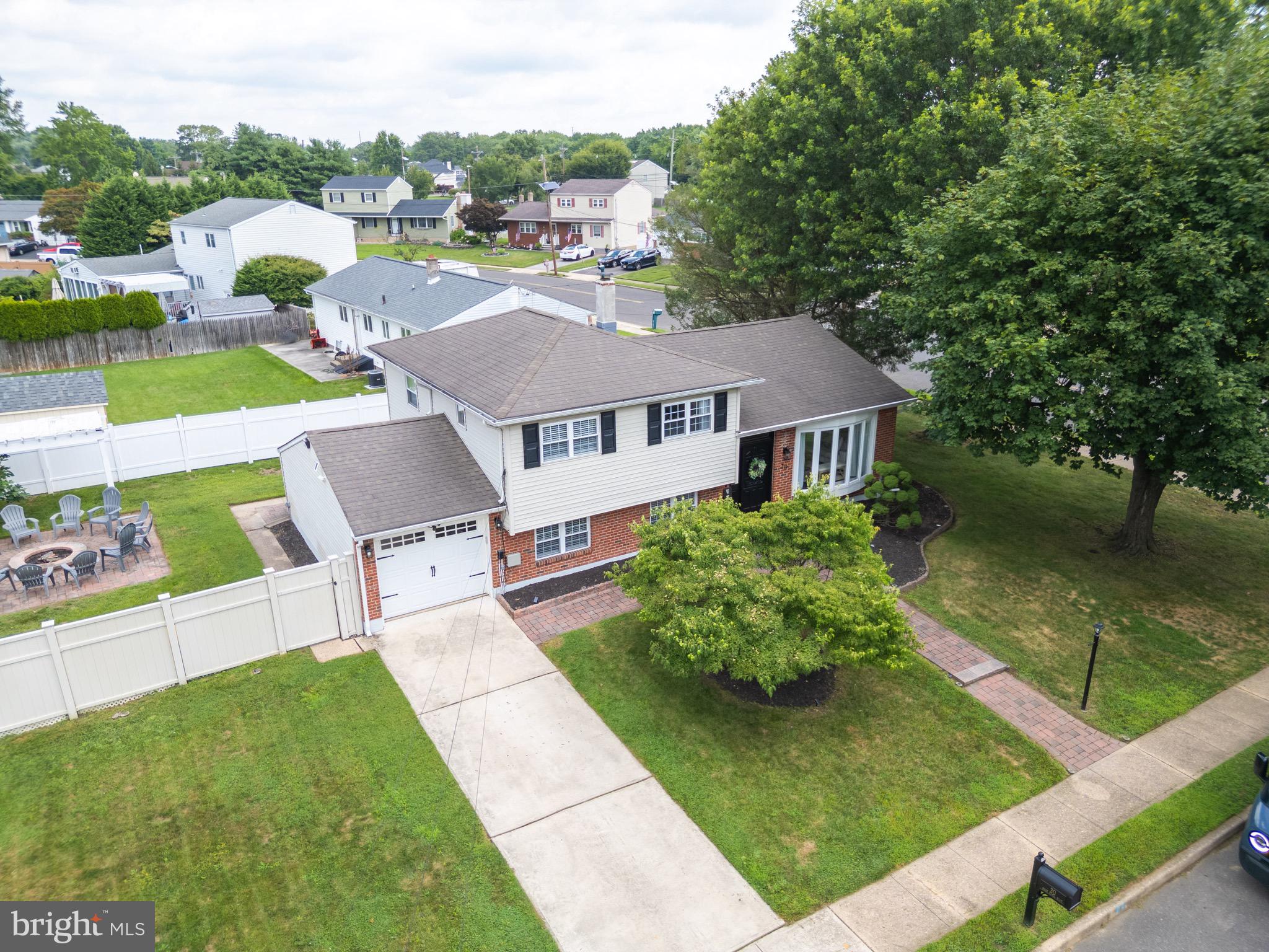 30 Rock Royal Road Hamilton, NJ 08620 - Photo 10 of 54 a aerial view of a house with a yard table and chairs