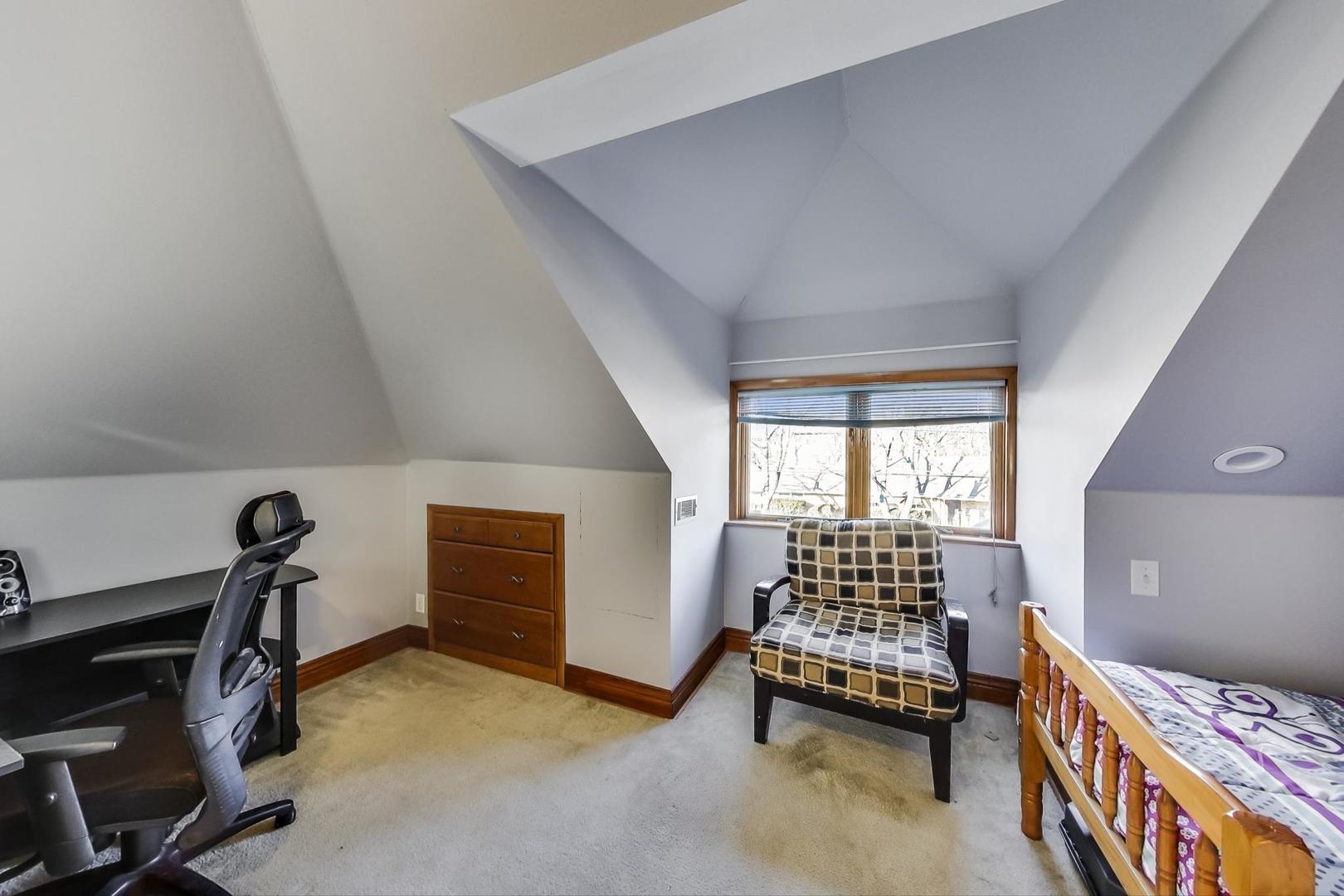 8107 West 30th Street North Riverside, IL 60546 - Photo 14 of 33 a bedroom with furniture and window