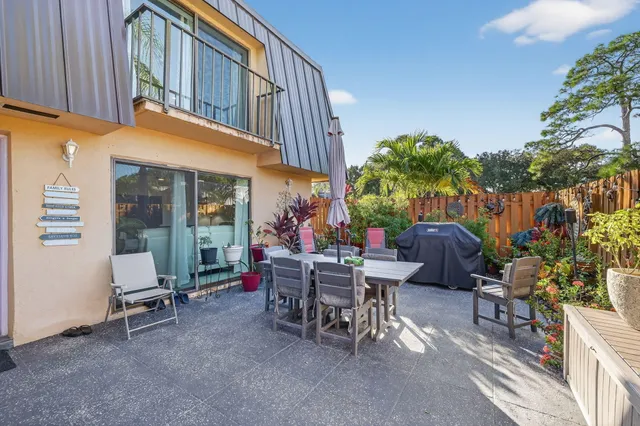 a view of a cafe with sitting area