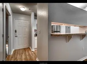 a kitchen with granite countertop a sink stove and cabinets