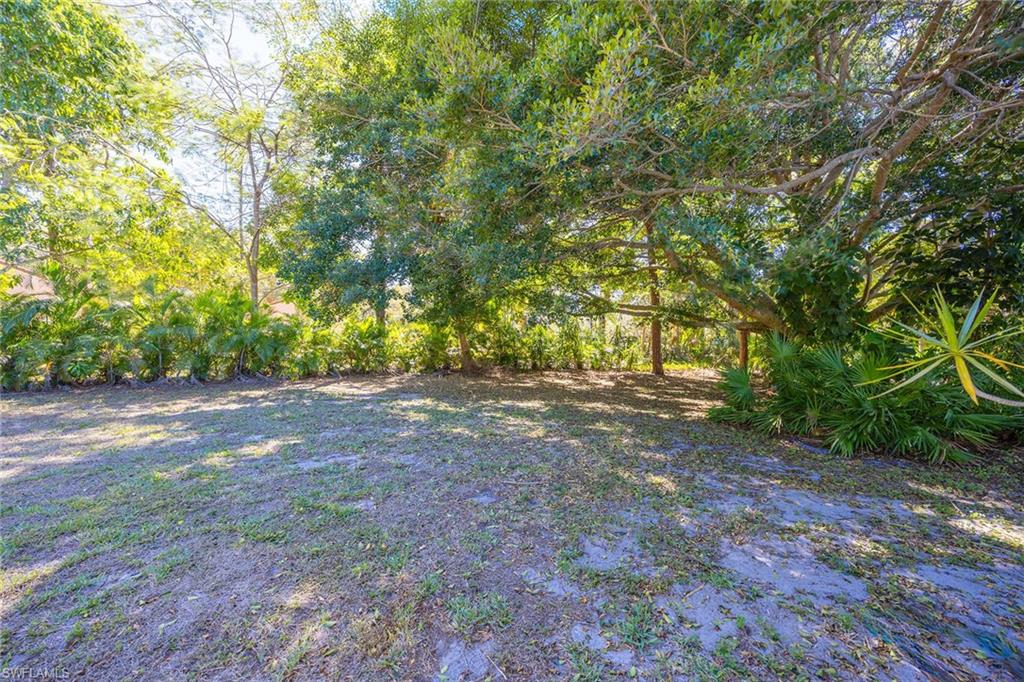 6574 Trail Boulevard Naples, FL 34108 - Photo 34 of 40 a view of outdoor space and yard
