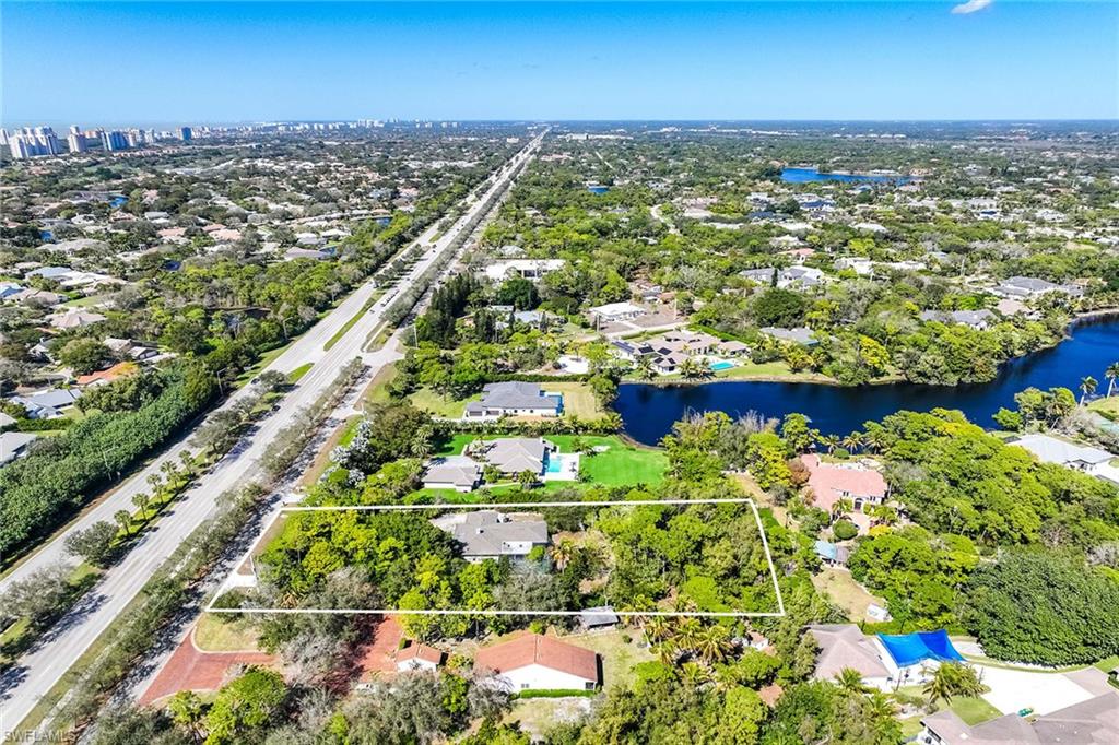 6574 Trail Boulevard Naples, FL 34108 - Photo 9 of 40 a view of a city with an ocean