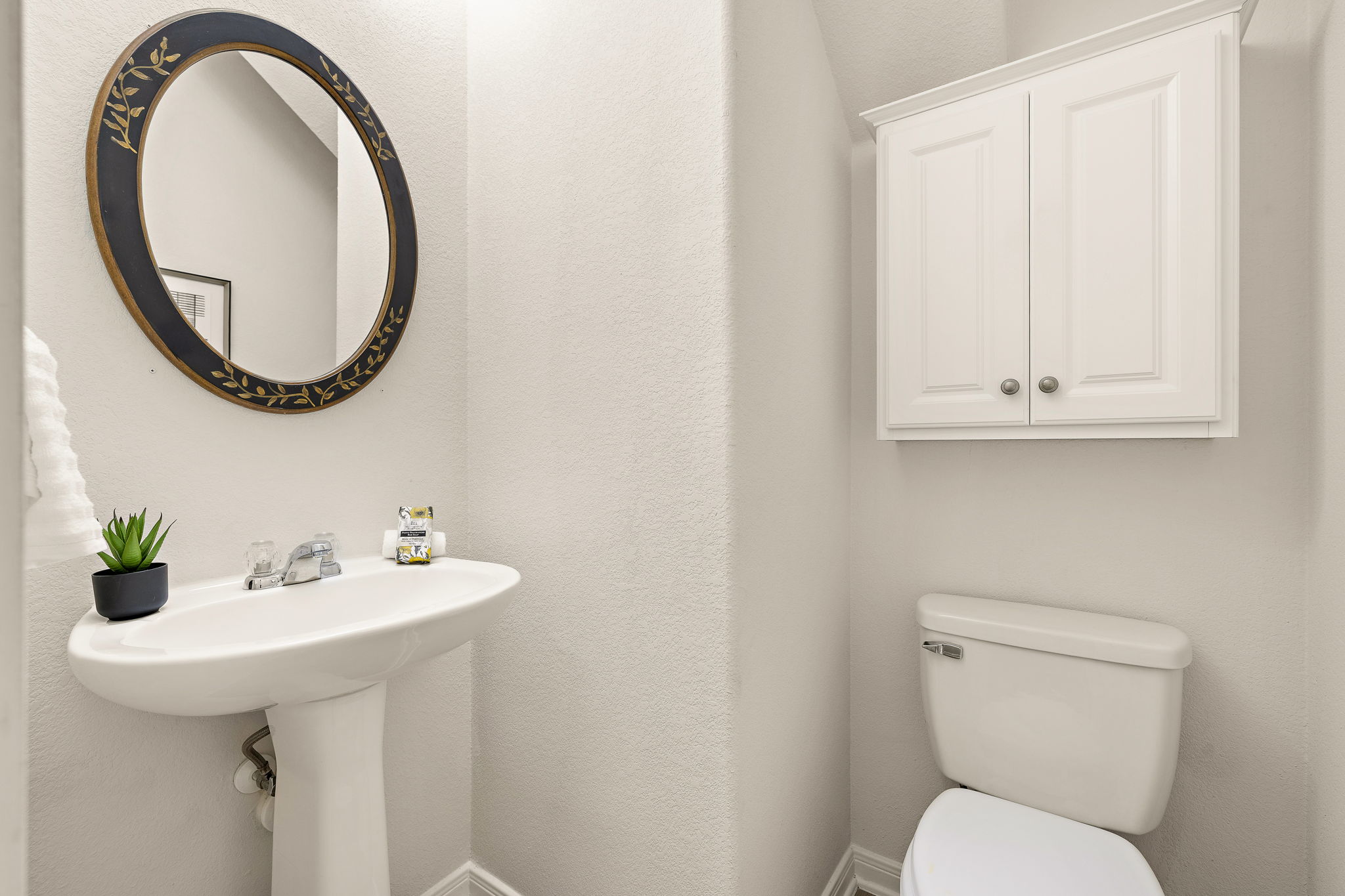 903 Fork Ridge Path Round Rock, TX 78665 - Photo 12 of 27 Half bathroom located on the first floor.