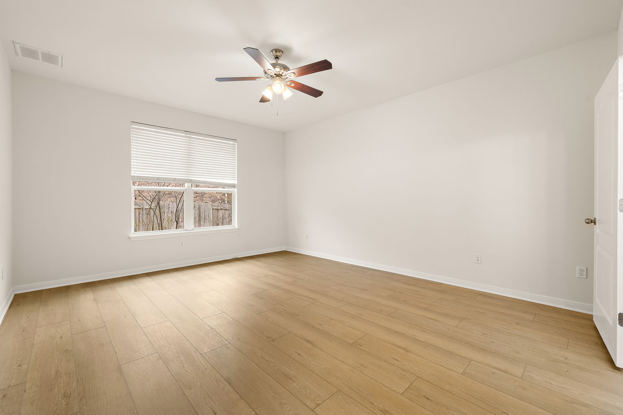 903 Fork Ridge Path Round Rock, TX 78665 - Photo 13 of 27 Wonderfully-sized primary bedroom located on the first floor.
