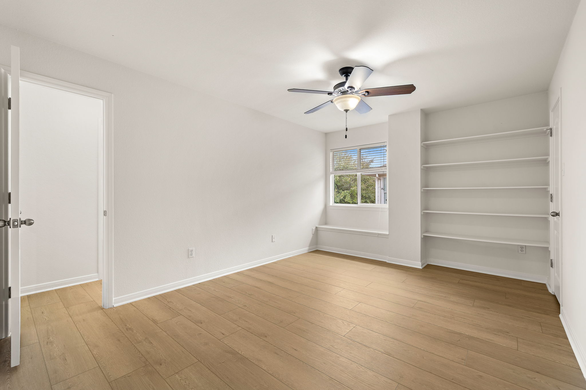 903 Fork Ridge Path Round Rock, TX 78665 - Photo 20 of 27 Secondary bedroom #1 on the second floor.