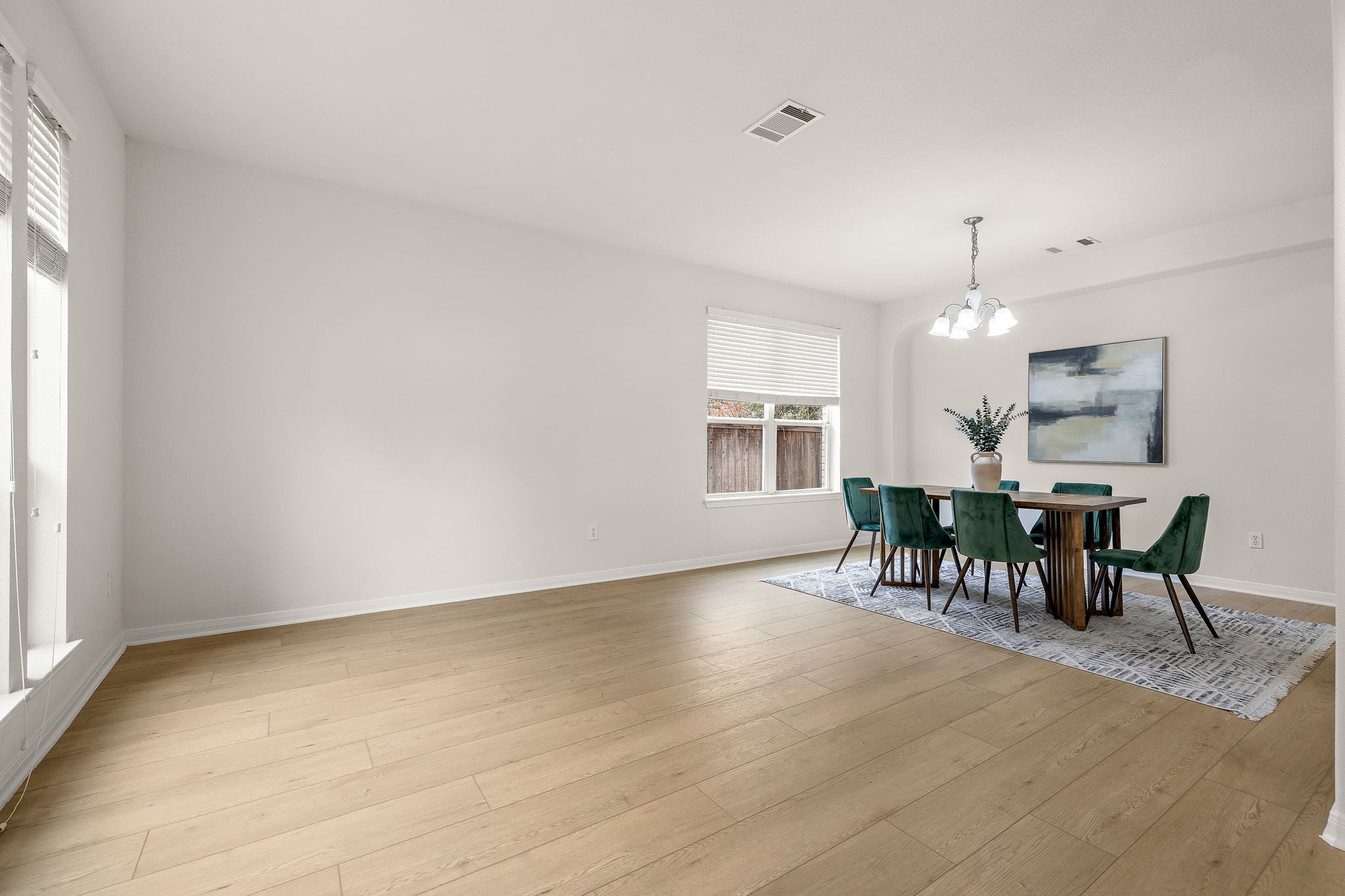 903 Fork Ridge Path Round Rock, TX 78665 - Photo 3 of 27 The large formal living and dining areas are great for entertaining.