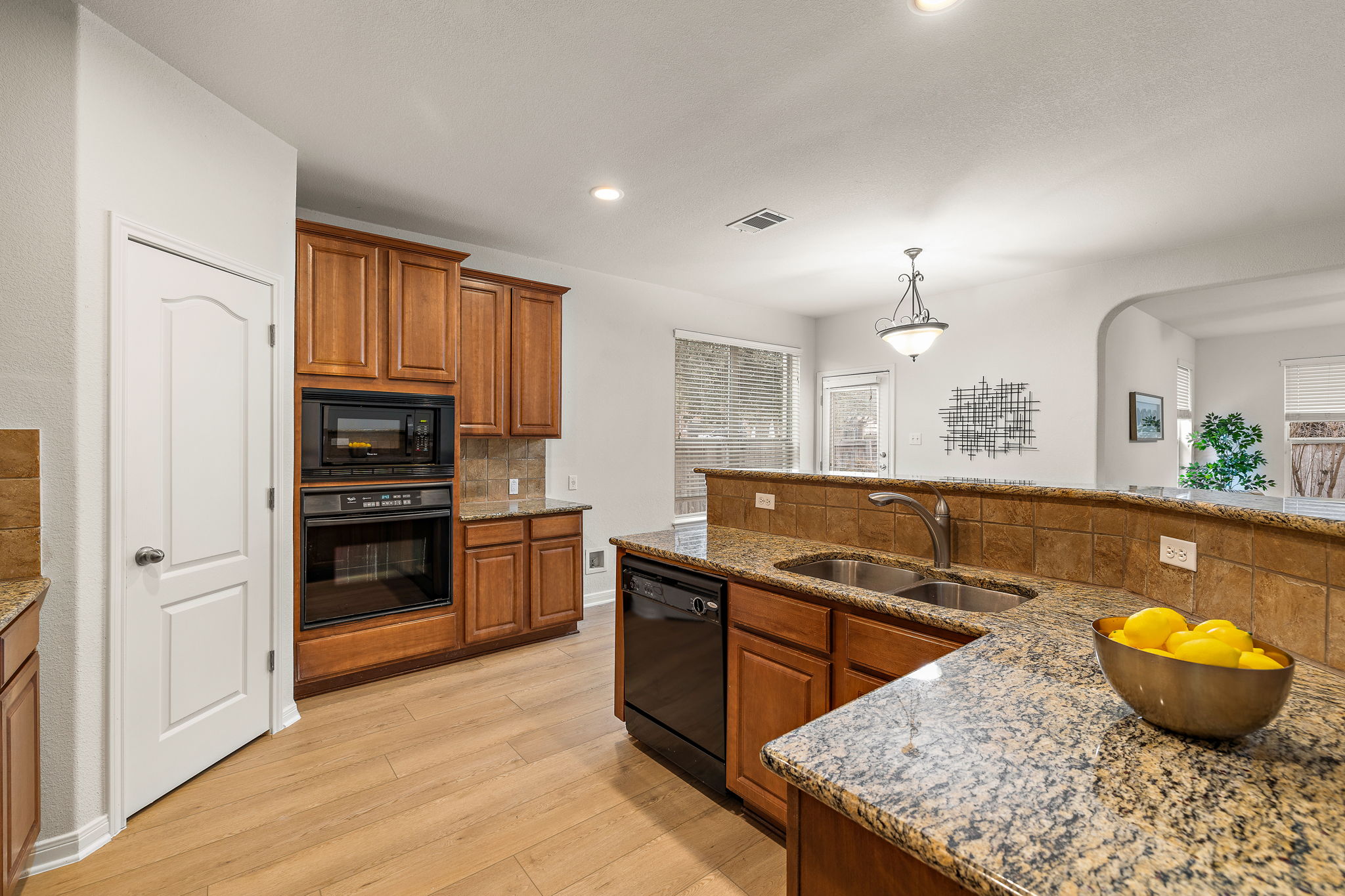 903 Fork Ridge Path Round Rock, TX 78665 - Photo 6 of 27 There is a spacious pantry that is centrally located.