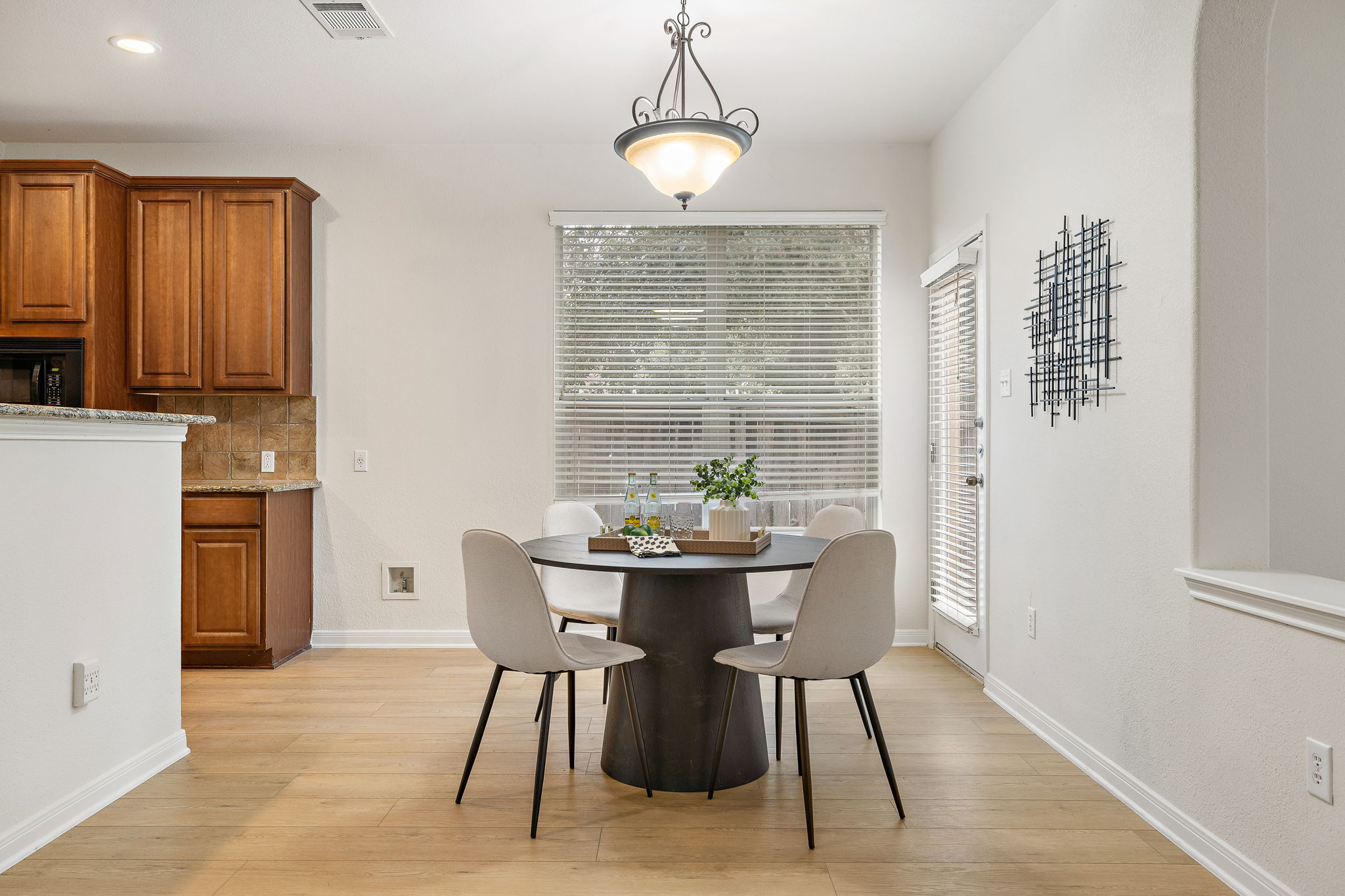903 Fork Ridge Path Round Rock, TX 78665 - Photo 7 of 27 Eat in breakfast area with a door to the backyard and patio.
