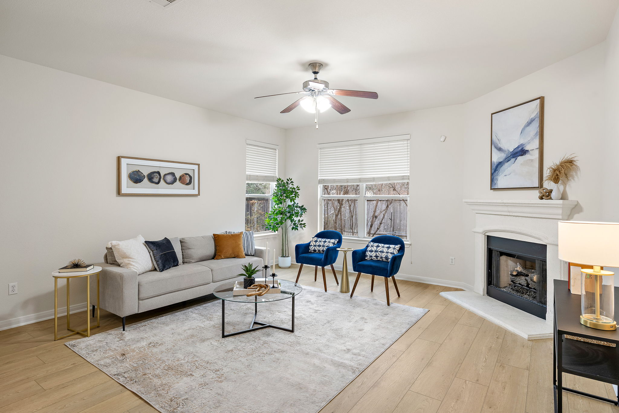903 Fork Ridge Path Round Rock, TX 78665 - Photo 9 of 27 Family room includes a gas fireplace for cozy nights in the cooler months.