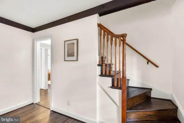 a view of entryway with wooden floor