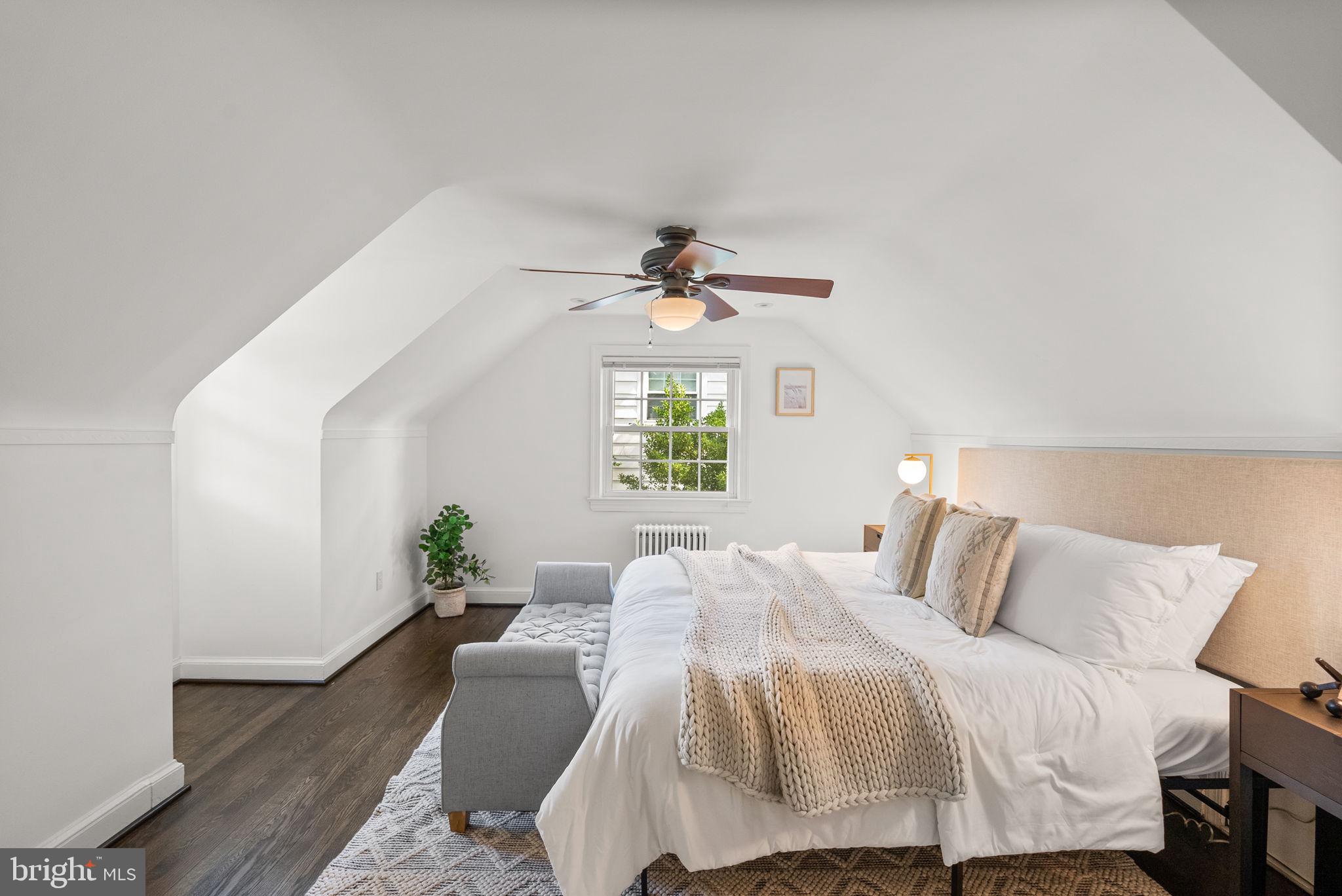 10603 South Dunmoor Drive Silver Spring, MD 20901 - Photo 20 of 41 a bedroom with a bed and a window