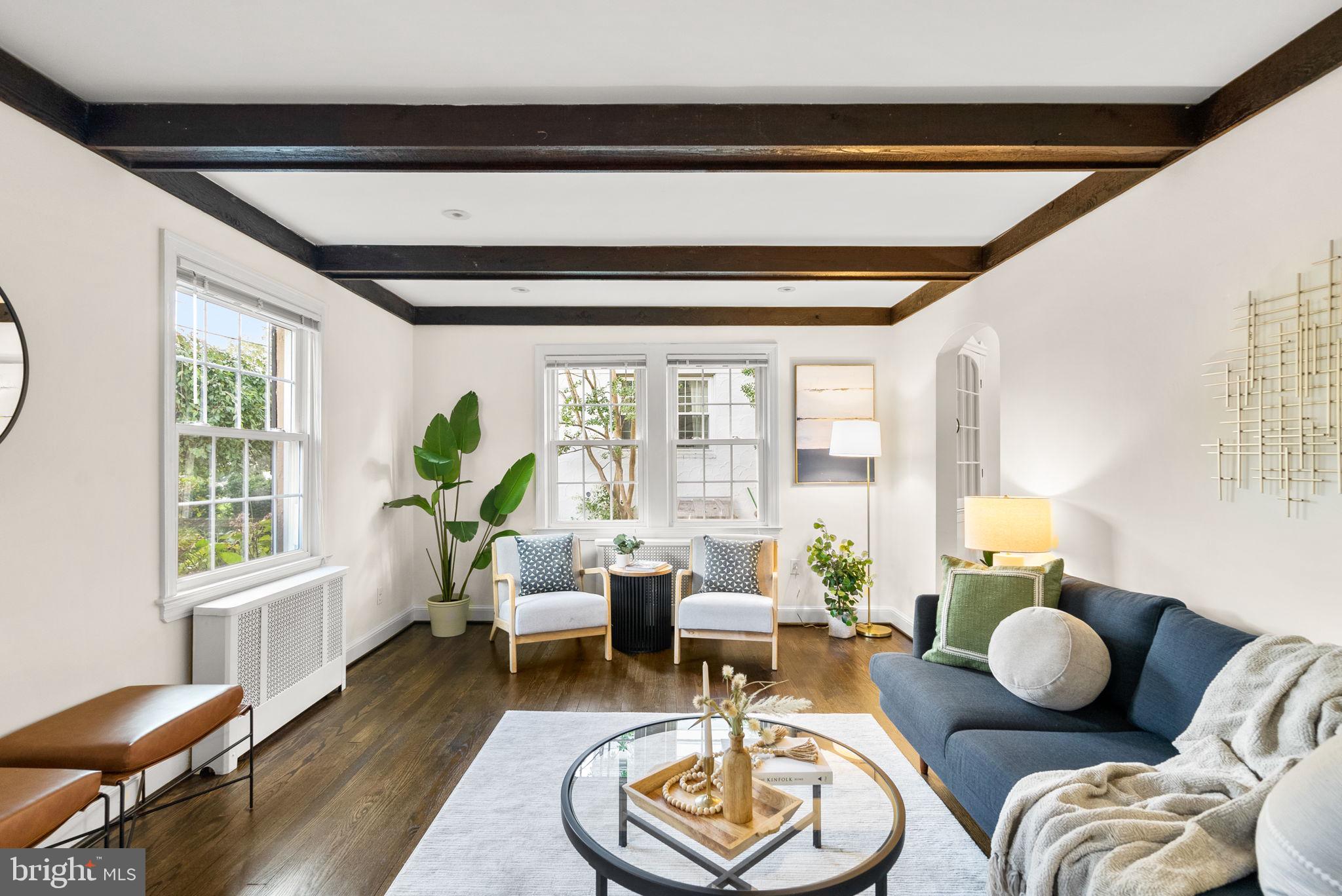 10603 South Dunmoor Drive Silver Spring, MD 20901 - Photo 2 of 41 a living room with furniture and a potted plant
