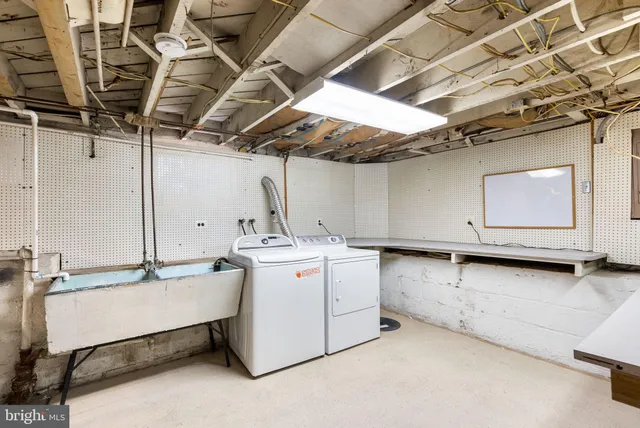 a utility room with cabinets