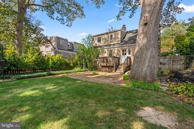 a view of a building with a yard
