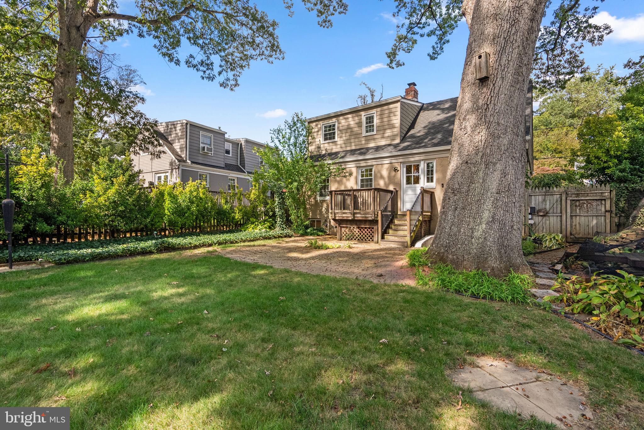 10603 South Dunmoor Drive Silver Spring, MD 20901 - Photo 33 of 41 a view of a building with a yard
