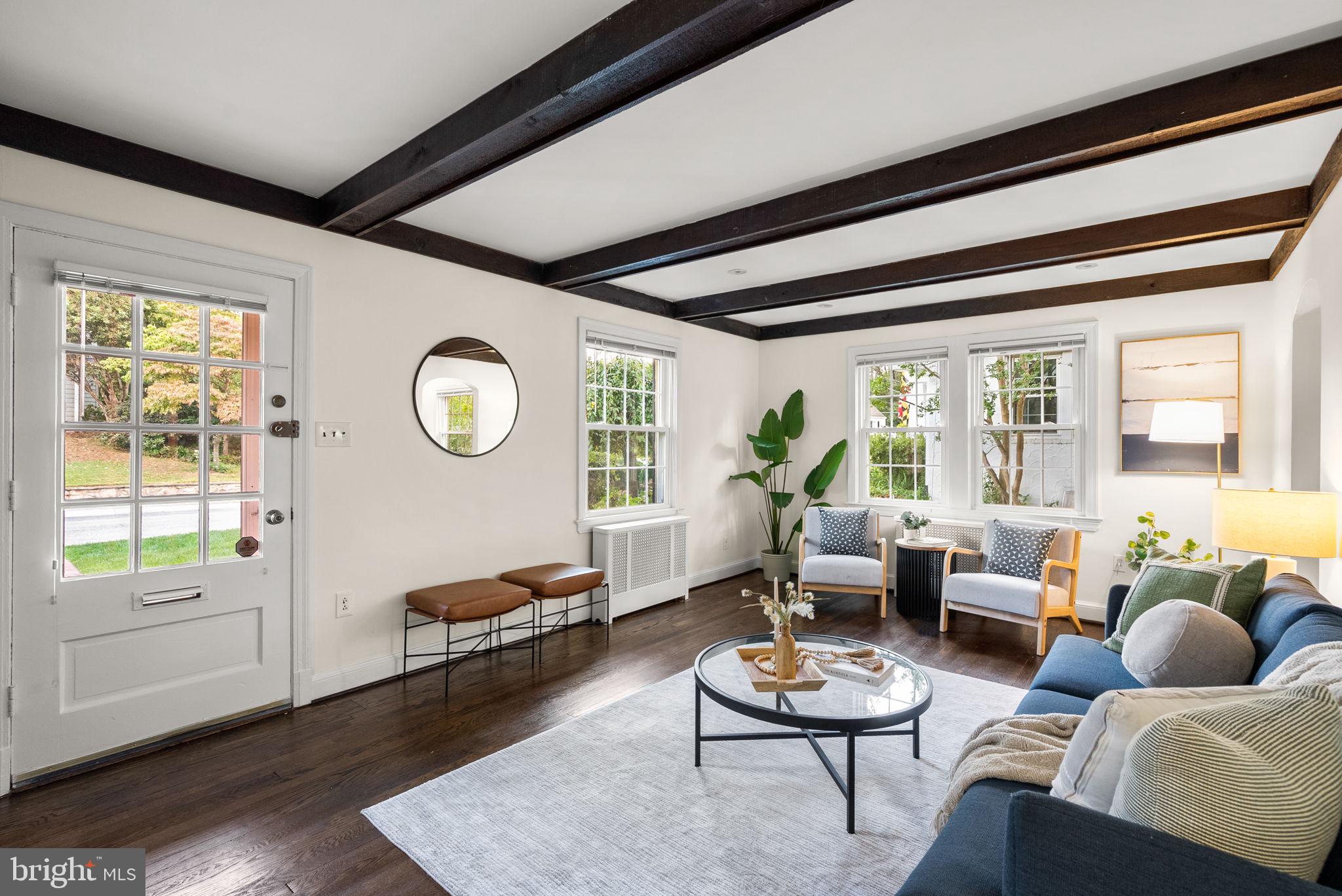 10603 South Dunmoor Drive Silver Spring, MD 20901 - Photo 4 of 41 a living room with furniture and a large window