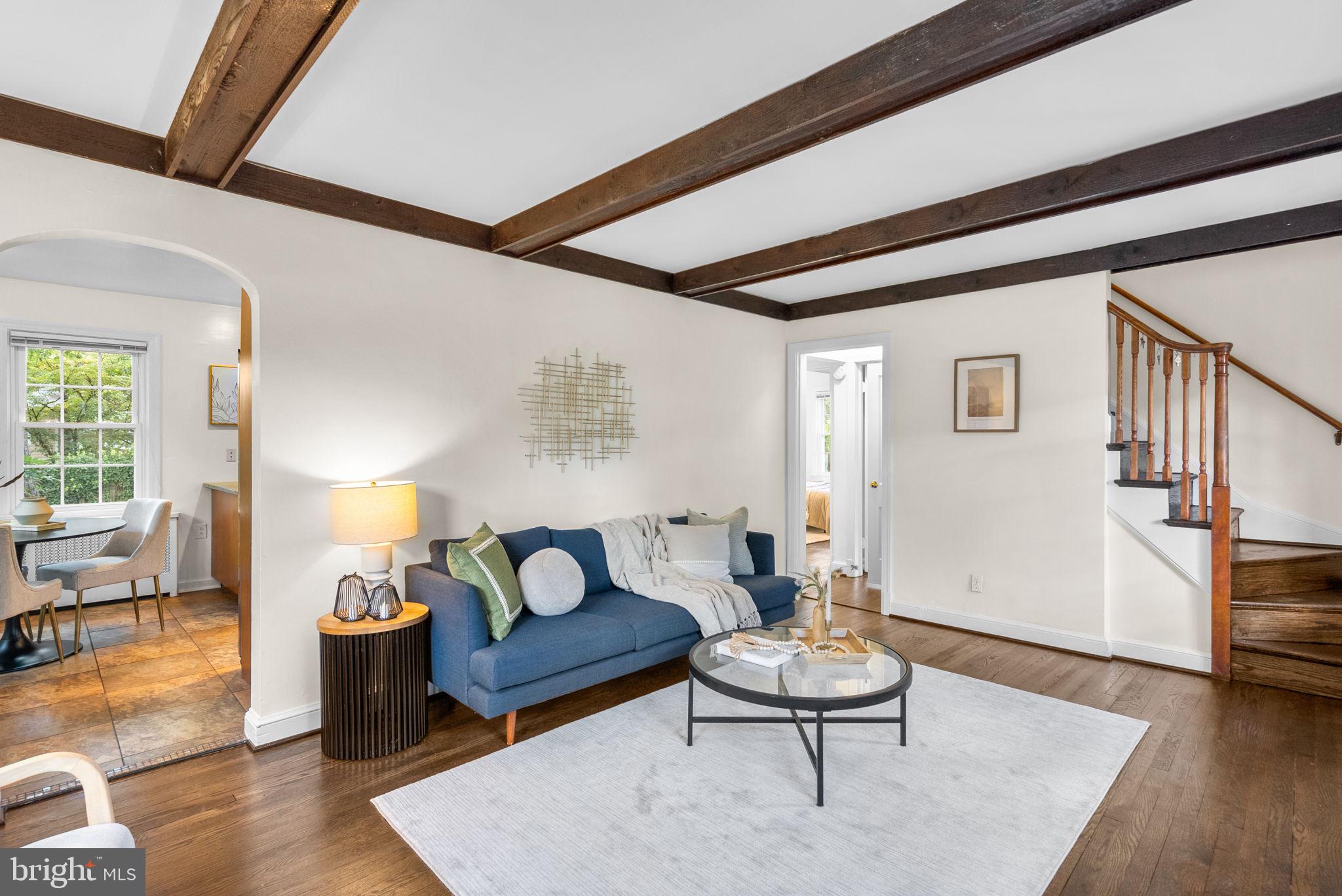 10603 South Dunmoor Drive Silver Spring, MD 20901 - Photo 5 of 41 a living room with furniture and a wooden floor