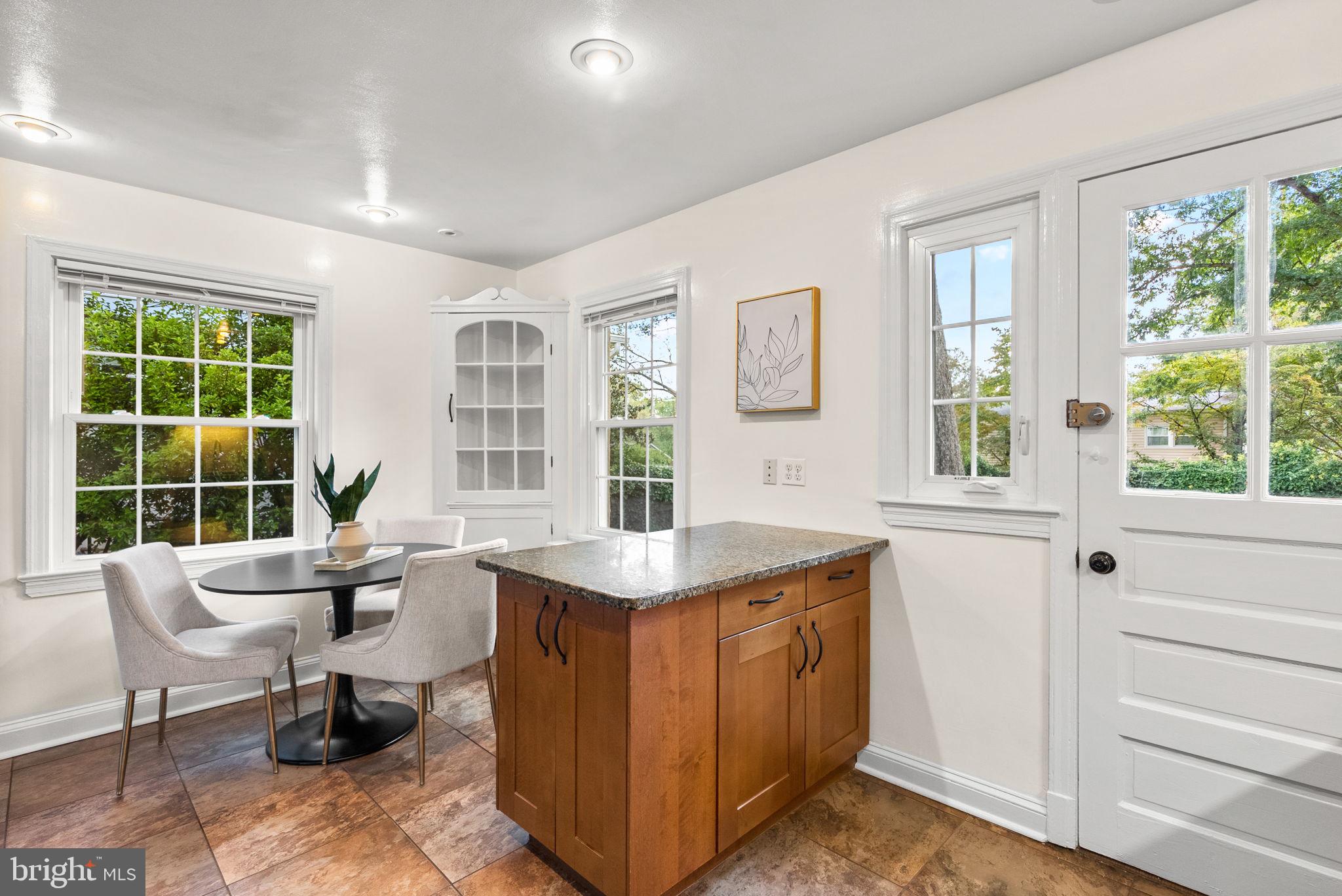 10603 South Dunmoor Drive Silver Spring, MD 20901 - Photo 10 of 41 a living room with furniture and windows
