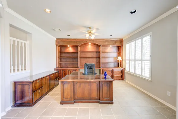 a room with furniture a window and storage