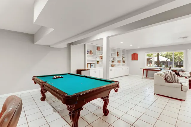a view of a house with a yard porch and sitting area