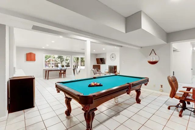 a view of a swimming pool with a patio