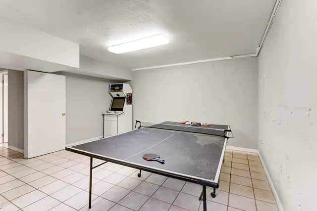 a house view with a sitting space and garden