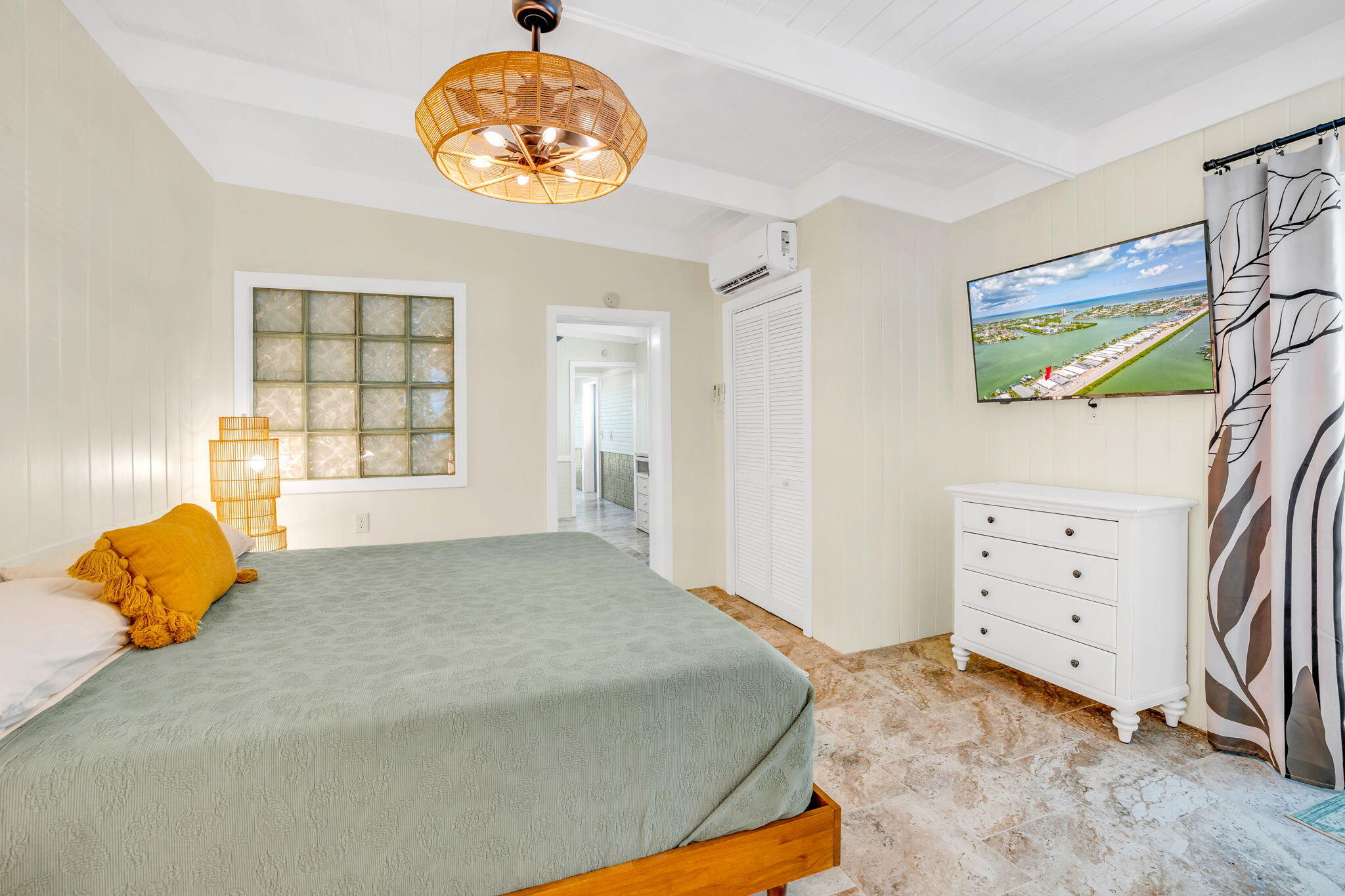 41 Sadowski Causeway Key Colony Beach, FL 33051 - Photo 16 of 40 a bedroom with a bed and a window
