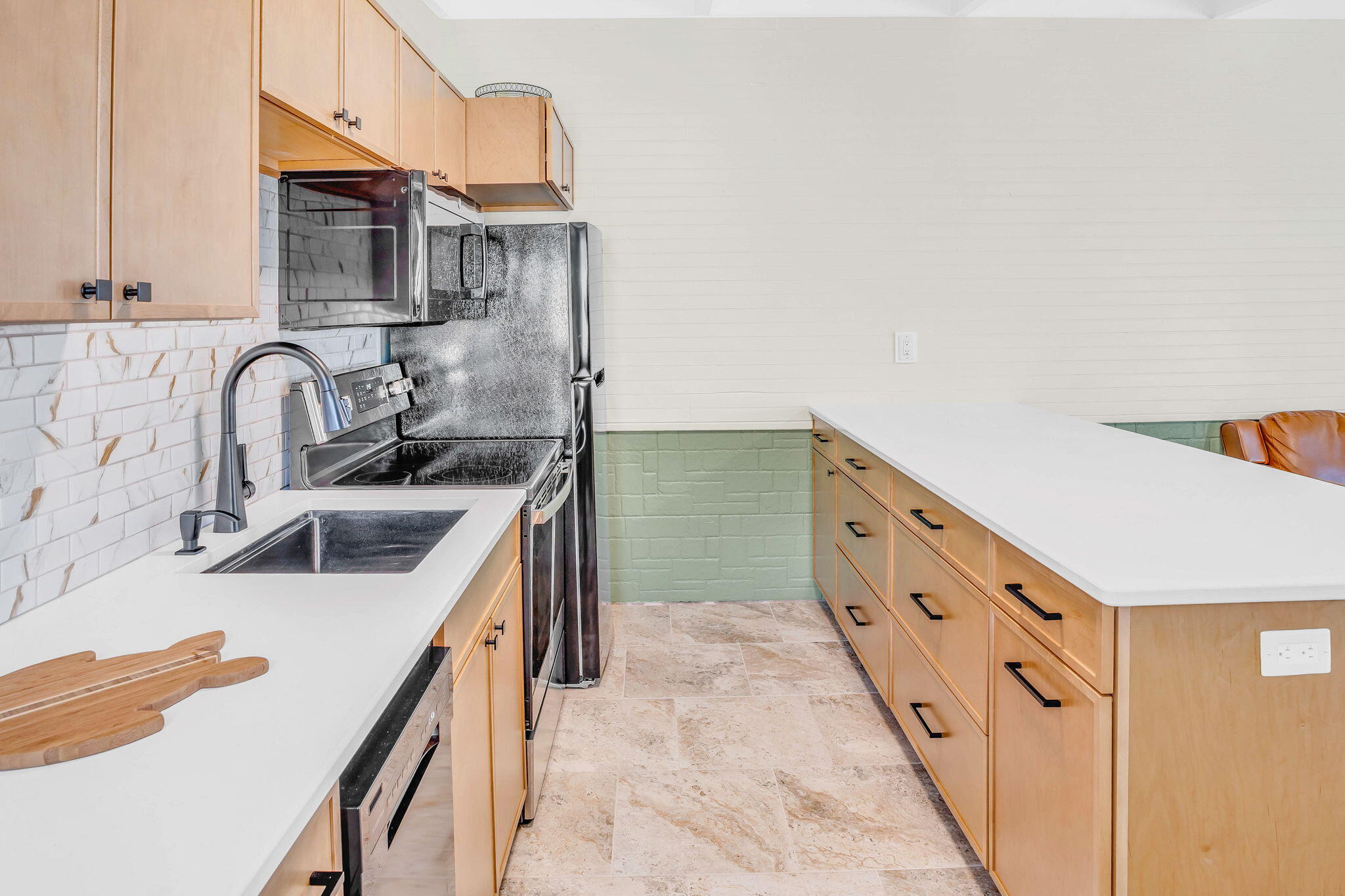41 Sadowski Causeway Key Colony Beach, FL 33051 - Photo 28 of 40 a kitchen with granite countertop a sink and a stove