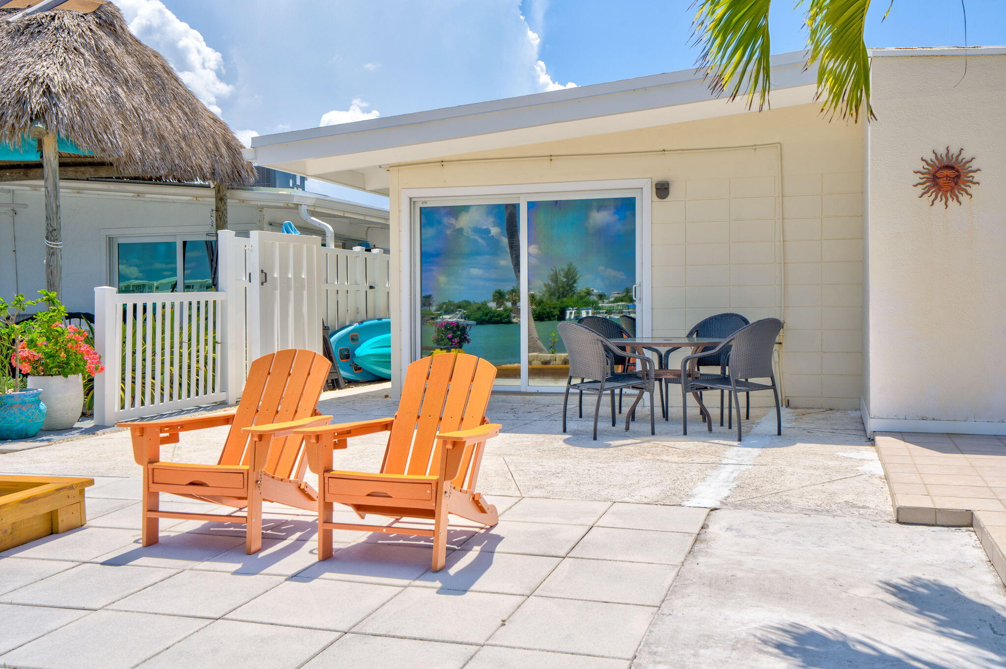 41 Sadowski Causeway Key Colony Beach, FL 33051 - Photo 33 of 40 a view of a chairs and tables in the patio