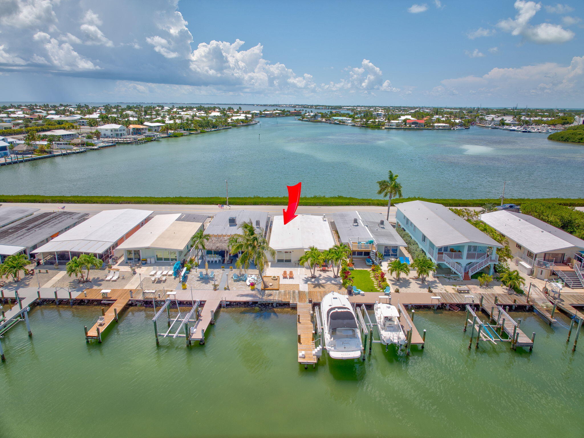41 Sadowski Causeway Key Colony Beach, FL 33051 - Photo 4 of 40 a aerial view of a house with a lake view