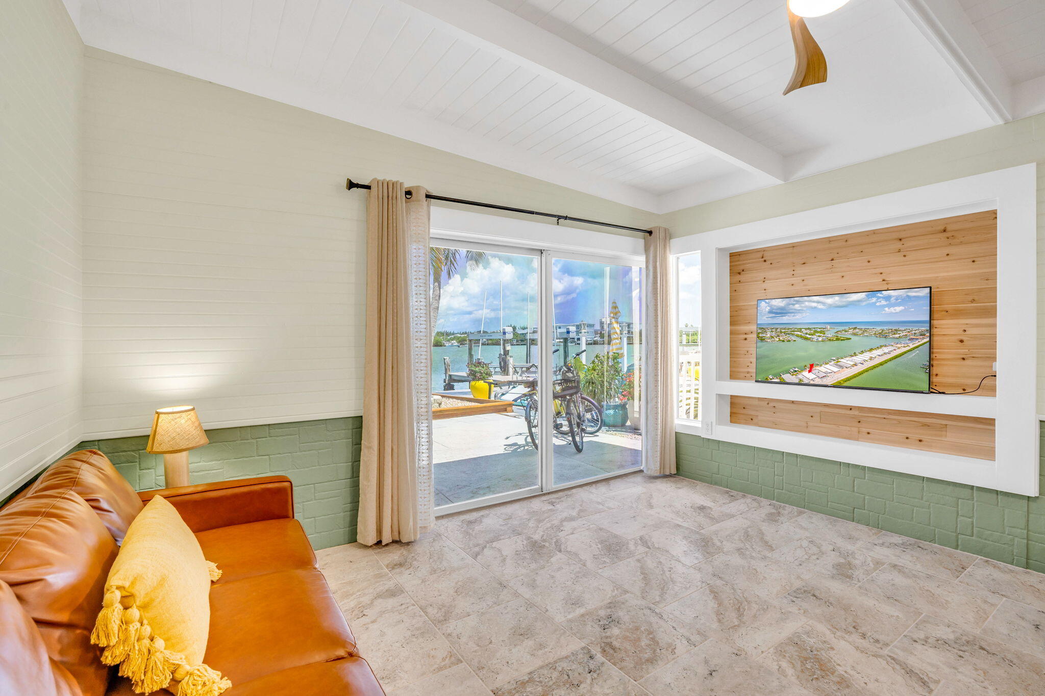 41 Sadowski Causeway Key Colony Beach, FL 33051 - Photo 5 of 40 a bedroom with furniture and a large window
